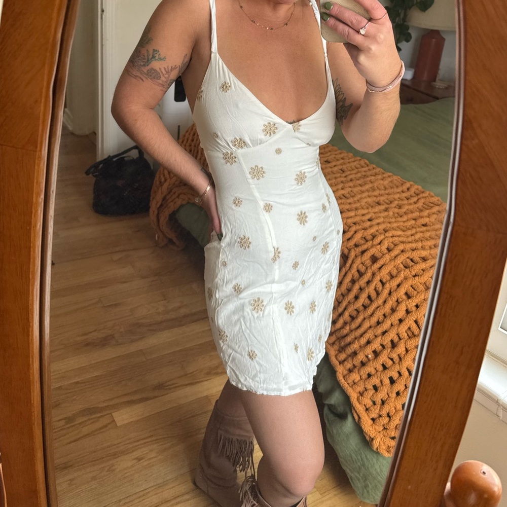 Sky to Moon little white dress with tan embroidered cutouts